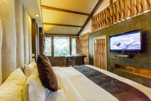 Imagen de la habitación del Hotel Lijiang Emerald Boutique. Foto 10