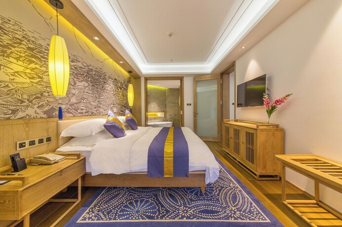 Imagen de la habitación del Hotel Lijiang Flavor Holiday Courtyard. Foto 17