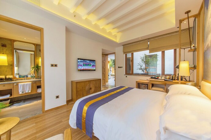 Imagen general del Hotel Lijiang Flavor Holiday Courtyard. Foto 10