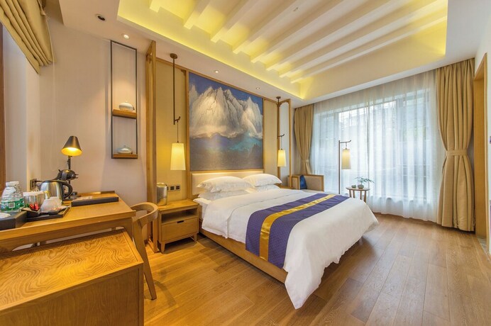 Imagen de la habitación del Hotel Lijiang Flavor Holiday Courtyard. Foto 20