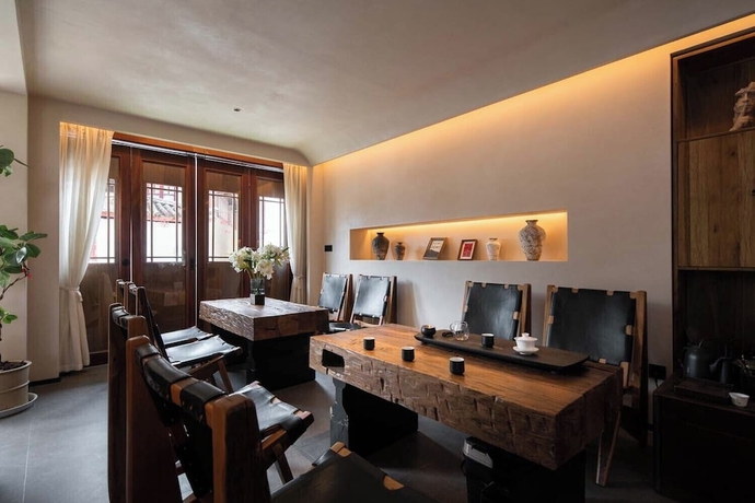 Imagen de los interiores del Hotel Lijiang Garden vacation PuZhi hotel. Foto 15
