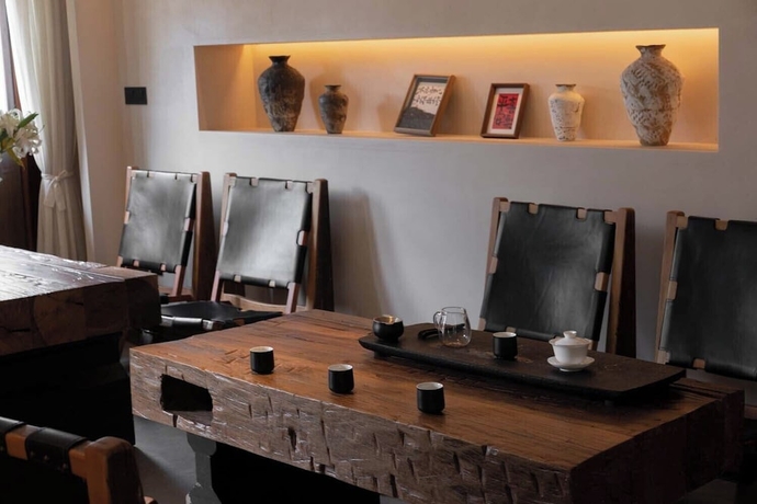 Imagen de los interiores del Hotel Lijiang Garden vacation PuZhi hotel. Foto 16