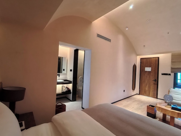 Imagen de la habitación del Hotel Lijiang Garden vacation PuZhi hotel. Foto 12