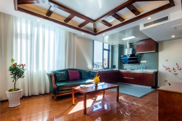 Imagen de la habitación del Hotel Lijiang Gemmer Hotel. Foto 2