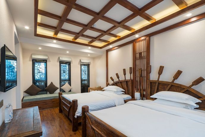 Imagen de la habitación del Hotel Lijiang Gemmer Hotel. Foto 3