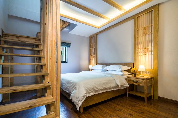 Imagen de la habitación del Hotel Lijiang Gemmer Hotel. Foto 4