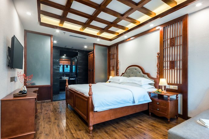 Imagen de la habitación del Hotel Lijiang Gemmer Hotel. Foto 6
