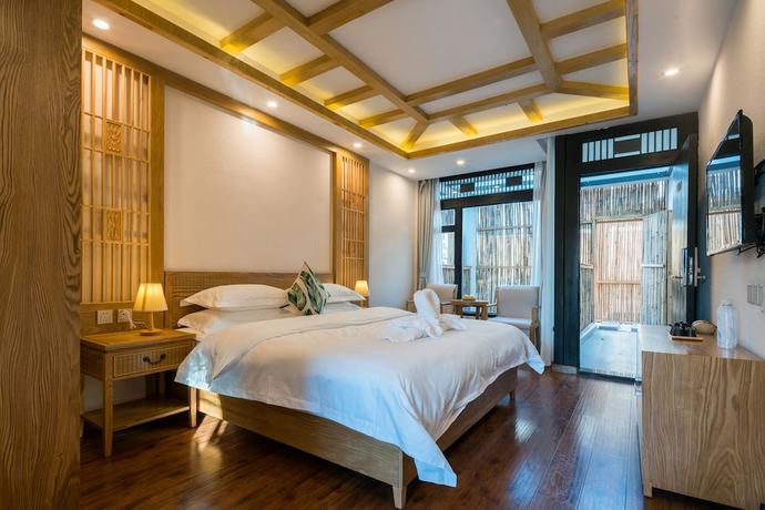 Imagen de la habitación del Hotel Lijiang Gemmer Hotel. Foto 7