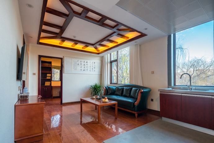 Imagen de la habitación del Hotel Lijiang Gemmer Hotel. Foto 11