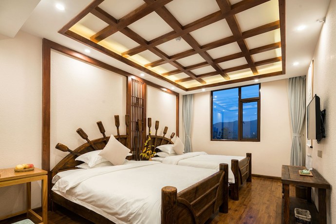 Imagen de la habitación del Hotel Lijiang Gemmer Hotel. Foto 15