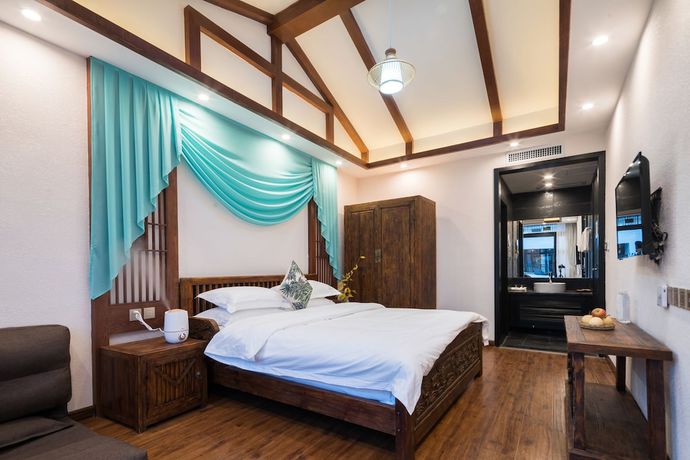 Imagen de la habitación del Hotel Lijiang Gemmer Hotel. Foto 16