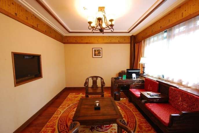 Imagen de la habitación del Hotel Lijiang Golden Path Hospitality Hotel. Foto 7