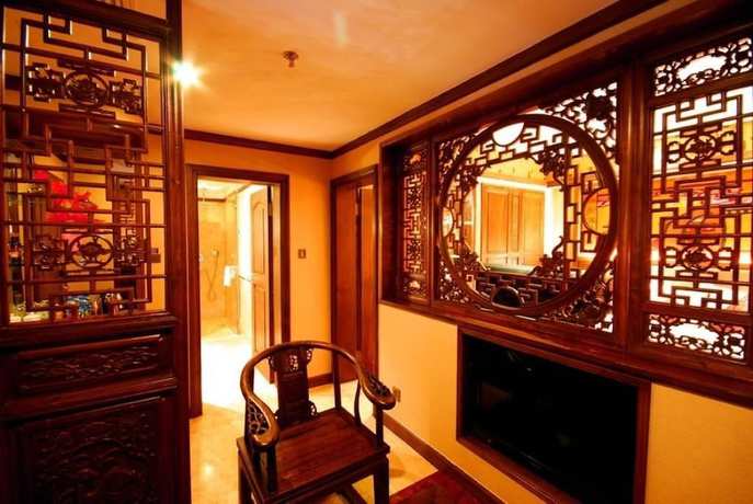 Imagen de la habitación del Hotel Lijiang Golden Path Hospitality Hotel. Foto 12