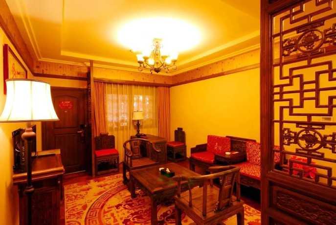 Imagen de la habitación del Hotel Lijiang Golden Path Hospitality Hotel. Foto 14
