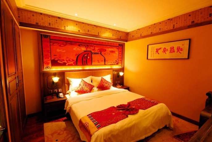 Imagen de la habitación del Hotel Lijiang Golden Path Hospitality Hotel. Foto 16