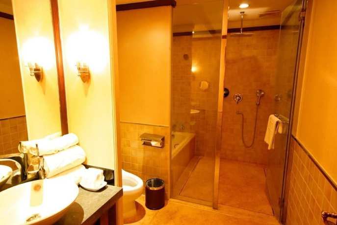 Imagen de la habitación del Hotel Lijiang Golden Path Hospitality Hotel. Foto 17