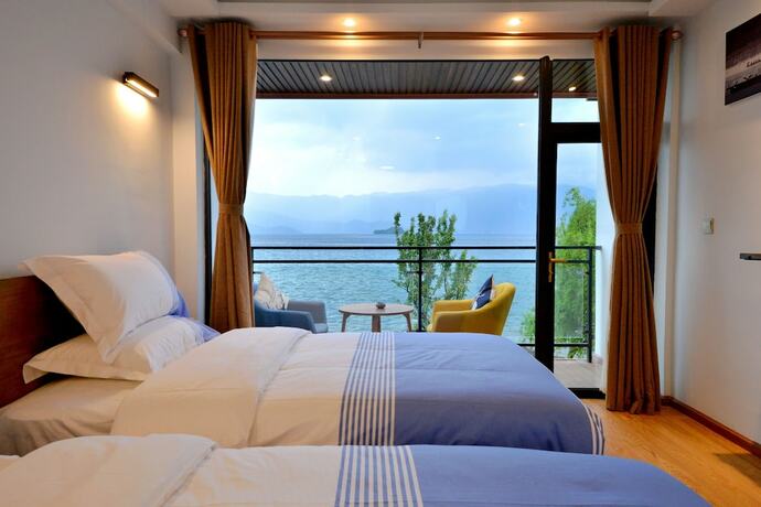 Imagen de la habitación del Hotel Lijiang Guanlanyue Inn. Foto 10