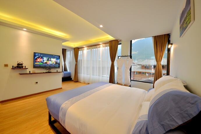 Imagen de la habitación del Hotel Lijiang Guanlanyue Inn. Foto 12