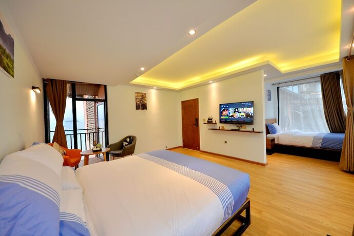 Imagen de la habitación del Hotel Lijiang Guanlanyue Inn. Foto 14