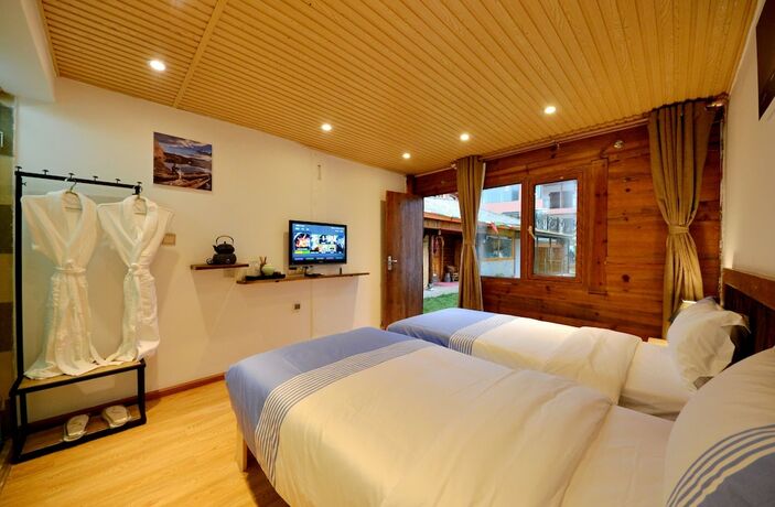 Imagen de la habitación del Hotel Lijiang Guanlanyue Inn. Foto 16