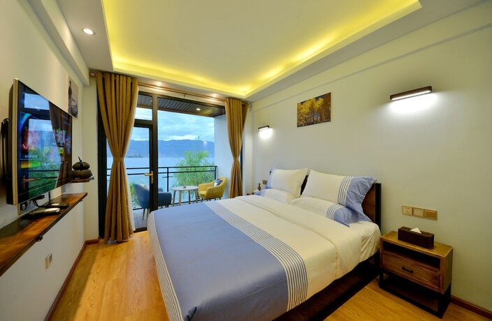Imagen de la habitación del Hotel Lijiang Guanlanyue Inn. Foto 17