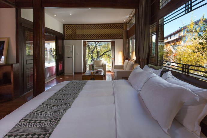 Imagen de la habitación del Hotel Lijiang Junpoxuan. Foto 2