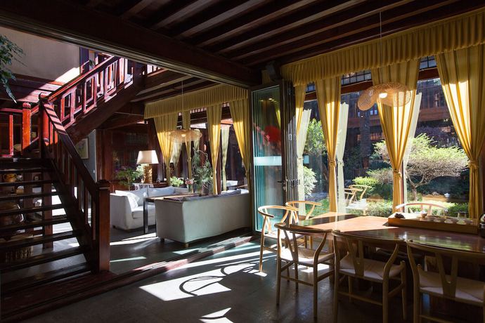 Imagen de la habitación del Hotel Lijiang Junpoxuan. Foto 4