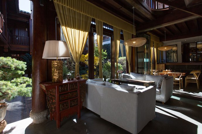 Imagen de la habitación del Hotel Lijiang Junpoxuan. Foto 5