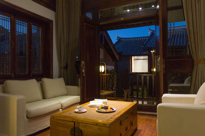 Imagen de la habitación del Hotel Lijiang Junpoxuan. Foto 9