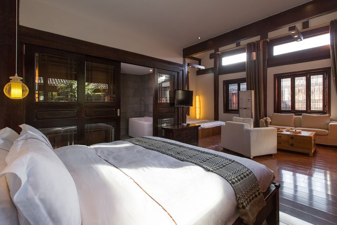 Imagen de la habitación del Hotel Lijiang Junpoxuan. Foto 10
