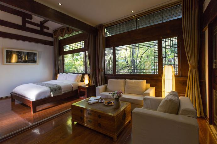 Imagen de la habitación del Hotel Lijiang Junpoxuan. Foto 11