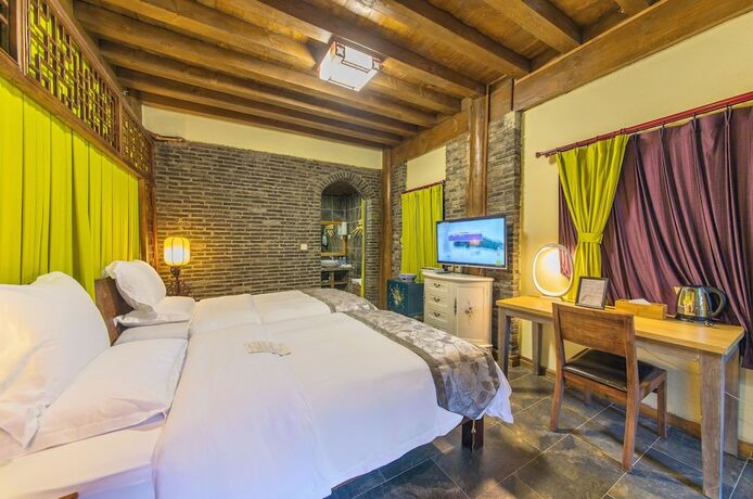 Imagen general del Hotel Lijiang Langyun Inn. Foto 10