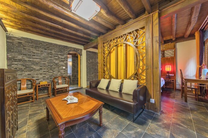 Imagen de la habitación del Hotel Lijiang Langyun Inn. Foto 12
