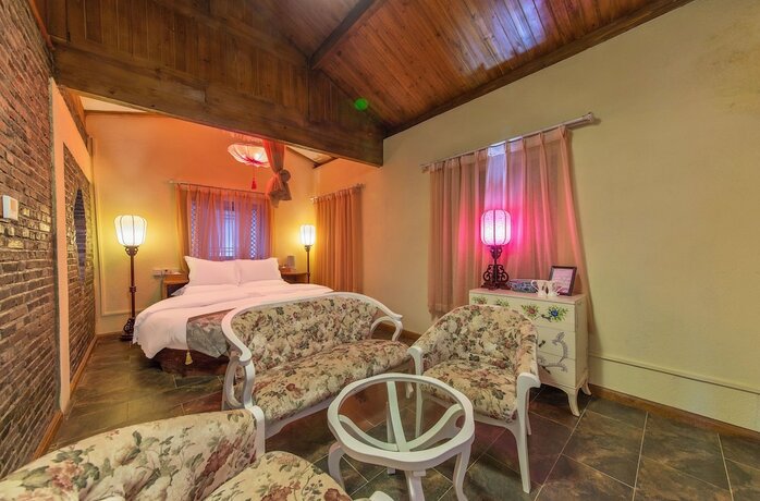 Imagen de la habitación del Hotel Lijiang Langyun Inn. Foto 13