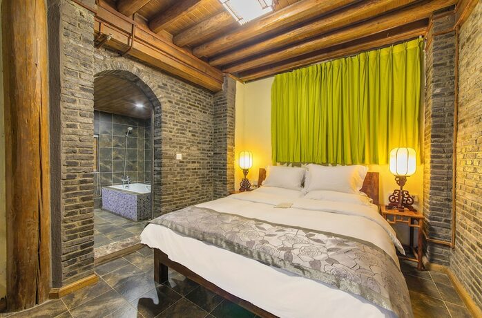 Imagen de la habitación del Hotel Lijiang Langyun Inn. Foto 14
