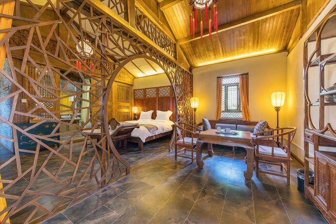 Imagen de la habitación del Hotel Lijiang Langyun Inn. Foto 15