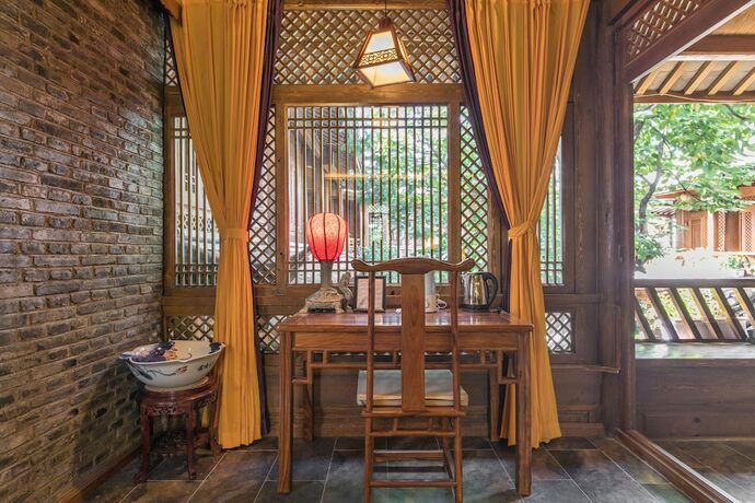 Imagen de la habitación del Hotel Lijiang Langyun Inn. Foto 16