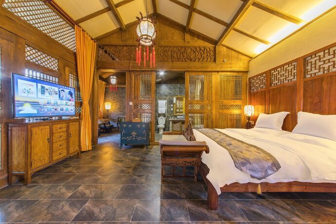 Imagen de la habitación del Hotel Lijiang Langyun Inn. Foto 19
