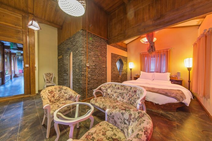 Imagen de la habitación del Hotel Lijiang Langyun Inn. Foto 21