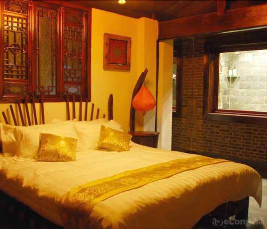 Imagen de la habitación del Hotel Lijiang Lazy Tiger Inn. Foto 3
