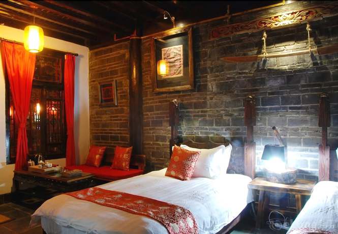 Imagen de la habitación del Hotel Lijiang Lazy Tiger Inn. Foto 4