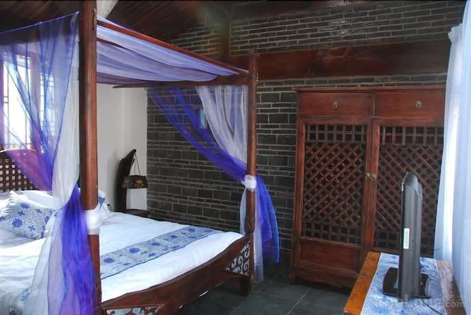 Imagen de la habitación del Hotel Lijiang Lazy Tiger Inn. Foto 7