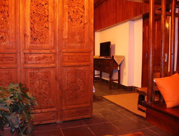 Imagen de la habitación del Hotel Lijiang Lazy Tiger Inn. Foto 8