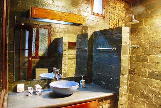 Imagen de la habitación del Hotel Lijiang Lazy Tiger Inn. Foto 10