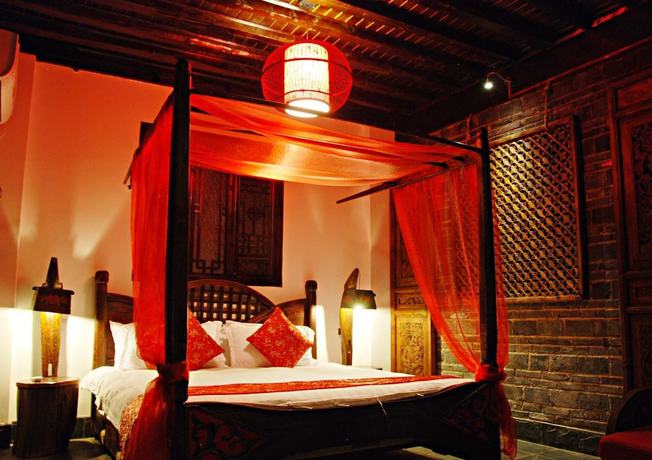 Imagen de la habitación del Hotel Lijiang Lazy Tiger Inn. Foto 11
