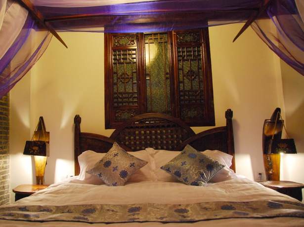 Imagen de la habitación del Hotel Lijiang Lazy Tiger Inn. Foto 12