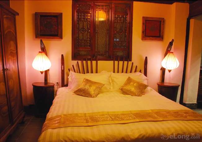 Imagen de la habitación del Hotel Lijiang Lazy Tiger Inn. Foto 13