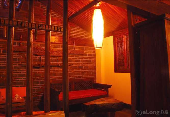 Imagen de la habitación del Hotel Lijiang Lazy Tiger Inn. Foto 14