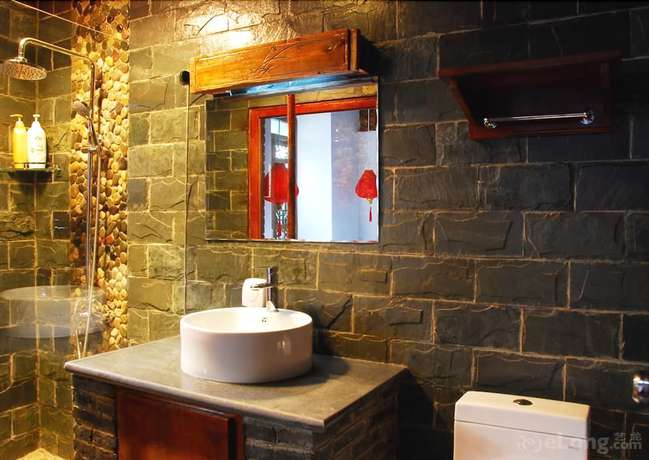 Imagen de la habitación del Hotel Lijiang Lazy Tiger Inn. Foto 15