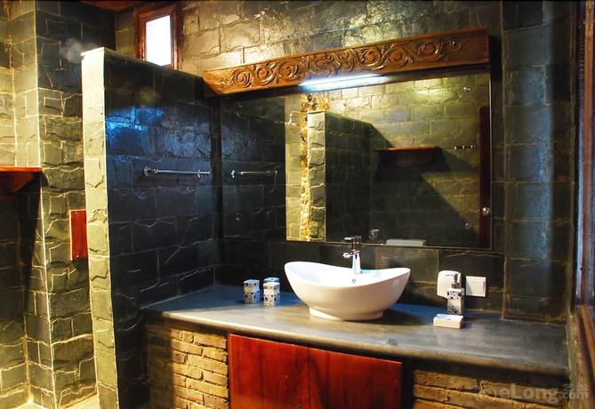 Imagen de la habitación del Hotel Lijiang Lazy Tiger Inn. Foto 19